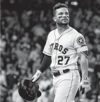  ?? Karen Warren / Staff photograph­er ?? Despite playing hobbled, Jose Altuve gave it his best shot, lining out to center field to strand one runner and end the eighth inning of Game 5 of the ALCS at Minute Maid Park.