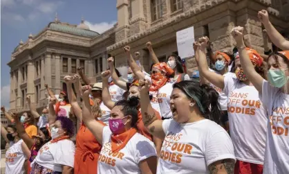  ??  ?? Women protest against the six-week abortion ban at the capitol in Austin, Texas, on 1 September. Photograph: Jay Janner/AP