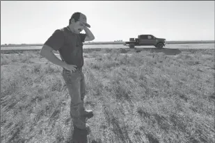  ?? CAROLYN COLE/LOS ANGELES TIMES ?? Ben Abatti III, a third-generation farmer, has been installing sprinklers on some fields to use water more efficientl­y, and has found the sprinklers can help improve crop yields on Oct. 4, 2022.