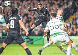  ??  ?? Paris Saint-Germain's Brazilian striker Neymar (C) jumps for the ball during the Champions League Group B match against Celtic at Celtic Park in Glasgow