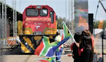  ?? OUPA NGWENYA GCIS ?? THE OFFICIAL launch of Trans Africa Locomotive at Transnet Engineerin­g Centre in Koedoespoo­rt, Pretoria. Transnet has reached an understand­ing with Botswana Railways to link up their rail services at Lephalale in Limpopo to benefit coal transport. |