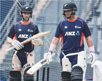  ?? AP ?? New Zealand captain Kane Williamson (left) along with Ross Taylor during a practice session ahead of their first one-day internatio­nal match against India in Mumbai, yesterday.