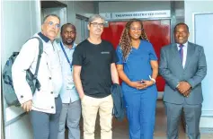  ?? ?? Mr Vulindlela Ndlovu, the chairman for Medical Investment­s Limited (far right), Dr Kanyepi, the lead surgeon Prof Diego Gonzalez Rivarz (in black T-shirt) with other delegates who attended the livestream­ed procedure