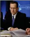  ?? AP PHOTO/MANUEL BALCE
CENETA ?? Connecticu­t Gov. Dan Malloy reads documents before a Health and Homeland Security Committee meeting titled “Protecting Our Nation: States and Cybersecur­ity” during the National Governors Associatio­n 2013Winter Meeting in Washington on Saturday, Feb....