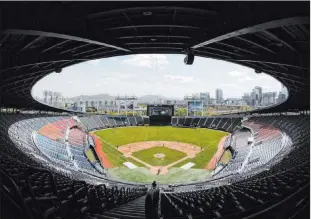  ?? Lee Jin-man The Associated Press ?? Jamsil Baseball Stadium of the Korean Baseball Organizati­on in Seoul, South Korea.