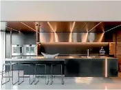  ??  ?? The NKBA Supreme Kitchen features a long island that appears to float.