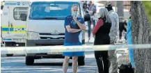  ??  ?? LUCKY TO BE ALIVE: Cape Town attorney William Booth, navy blue shirt, outside his Higgovale home after an attempt on his life on Thursday morning.