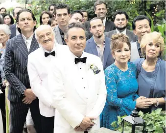  ?? CLAUDETTE BARIUS ?? Rubén Rabasa, second from left, with Andy García, center, in the new version of ‘El Padre de la Novia.’ Right, left to right, Rubén Rabasa, Adriana Gaviria, René Granados, Ashley Álvarez, Vivian Ruiz, James Puig, Jezabel Montero, Caleb Scott and Andy Méndez in ‘The Cubans.’