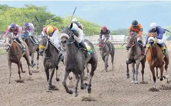  ?? ALLEN/PHOTOGRAPH­ER IAN ?? LICI’S PEPSI (centre), with Javaniel Patterson aboard, capturing the seventh race at Caymanas Park last Saturday.