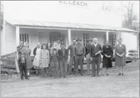  ?? COURTESY PHOTOS ?? The R.L. Leach Grocery Store of Dutch Mills was owned by Raymond and Ruth Leach. It was two buildings combined, the original store built in 1925 and the Sycamore Filling Station. The Leaches bought the filling station across the street and had it moved over and joined to the store. This photo shows the combined building.