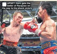  ??  ?? UPSET: Horn gets the better of Pacquiao on the way to his shock victory