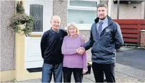  ??  ?? Excellent service Greer Gibson of Callaghan Windows with John and Nancy Given outside their home in Patna