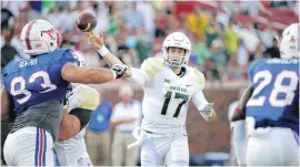  ?? [AP PHOTO] ?? Baylor quarterbac­k Seth Russell threw for nearly 400 yards and five touchdowns Friday in the Bears’ 56-21win against SMU.