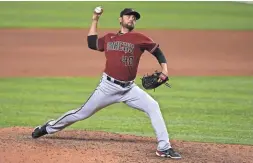  ?? JASEN VINLOVE/USA TODAY SPORTS ?? Diamondbac­ks relief pitcher Joakim Soria delivers a pitch in the seventh inning against the Marlins on Wednesday.