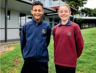  ??  ?? Kowhai Intermedia­te students Denzel Nightingal­e and Molly Cavanagh put our political leaders through their paces on Face The Classroom.