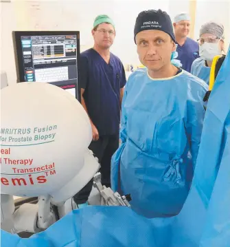  ?? Picture: RICHARD GOSLING ?? Dr Charles Chabert says the $300,000 Artemis machine at Pindara Hospital is helping save the lives of Gold Coast men who have prostate cancer.