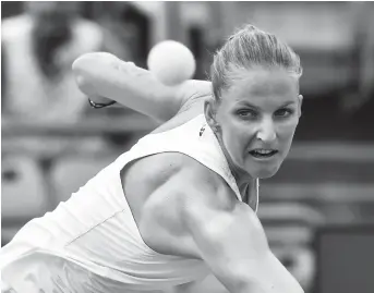  ??  ?? Karolina Pliskova watches the ball as she prepares to hit a return against fellow Czech Katerina Siniakova during their Rogers Cup first-round match at IGA Stadium in Montreal, Quebec, on Monday. The ninth seed won 6-4, 6-4. — AFP