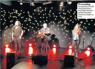  ??  ?? TV recording Rachael Macdonald, David Nicholson and Alijah Nerheim performing their Christmas single on STV2