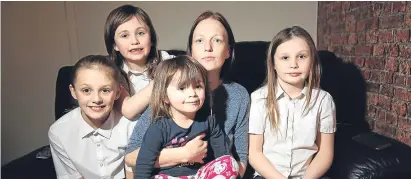  ?? Picture: Kris Miller. ?? St Andrews mum Emma Barton, with daughters Naomi, Lily, Lexi and Skye, says her family is effectivel­y priced out of the area’s property market.