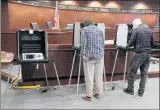  ?? MICHAEL CONROY/AP ?? Voters prepare their ballots last month during early voting in Indiana, one of four states that had primaries Tuesday.