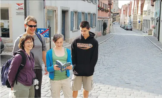  ?? RICK STEVES ?? Small towns like Rothenburg, Germany, are perfect spots for teens to take a turn at leading the way, or for simply exploring the neighbourh­ood a bit on their own.
