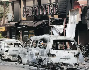  ?? SUNDAY ALAMBA / THE ASSOCIATED PRESS ?? Four jihadist attackers linked to al-Qaida were killed by Burkina Faso and French security forces hours after they stormed the Splendid Hotel and nearby Cappuccino Cafe.