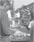  ??  ?? Passengers stop for food on the way to Shimla.