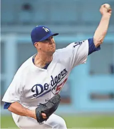  ?? KELVIN KUO, USA TODAY SPORTS ?? Alex Wood dominated the Diamondbac­ks on Wednesday, burnishing his All-Star case and improving to 10-0.