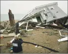  ?? Brian A. Pounds / Hearst Conn. Media file photo ?? FEMA workers tour a some of the Superstorm Sandy devastatio­n on Fairfield Beach Road in Fairfield on Nov. 27, 2012.