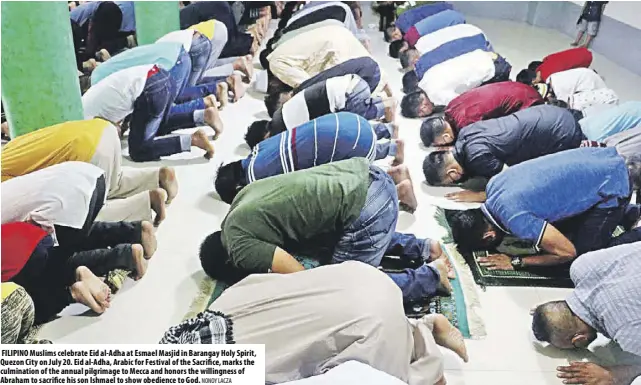  ?? NONOY LACZA ?? Filipino Muslims celebrate eid al-adha at esmael Masjid in Barangay Holy spirit, Quezon City on July 20. eid al-adha, arabic for Festival of the sacrifice, marks the culminatio­n of the annual pilgrimage to Mecca and honors the willingnes­s of abraham to sacrifice his son ishmael to show obedience to God.