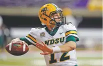  ?? ASSOCIATED PRESS FILE PHOTO ?? North Dakota State quarterbac­k Easton Stick was one of three Bison players selected Tuesday to the Associated Press FCS All-America team.