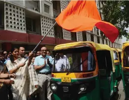  ?? — ASIAN AGE ?? MoS for health and family welfare Anupriya Patel flags off an auto rally on the occasion of World Tobacco Day in New Delhi on Thursday.