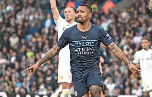  ?? (AFP) ?? Manchester City’s striker Gabriel Jesus (centre) celebrates after scoring their third goal during the English Premier League match at Elland Road in Leeds, on Saturday.