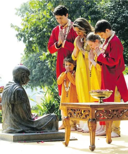  ?? A JIT SOLANKI / THE ASSOCIATED PRESS ?? “Colourful and classy,” gushed The Indian Express newspaper, saying Justin Trudeau “seemingly has an affinity for Indian ethnic wear.” The newspaper praised Trudeau for wearing a “bright red kurta” on his visit to a former home of Mahatma Gandhi. The...