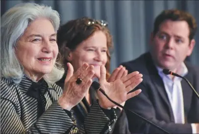  ?? PHOTOS PROVIDED TO CHINA DAILY ?? Jan Berris (left) making a speech at a subnationa­l symposium in 2019.