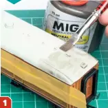  ??  ?? STEP BY STEP Mask the glazing and shake the weathering wash thoroughly before brushing a light coating over the carriage roof. A flat brush is most effective, using lateral strokes and ensuring that the pigment collects around any raised or recessed details. 1