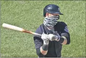  ?? KATHY WILLENS — THE ASSOCIATED PRESS ?? New York Yankees’ Clint Frazier wears a face mask while batting during an intrasquad game in summer training camp on Sunday at Yankee Stadium in New York.