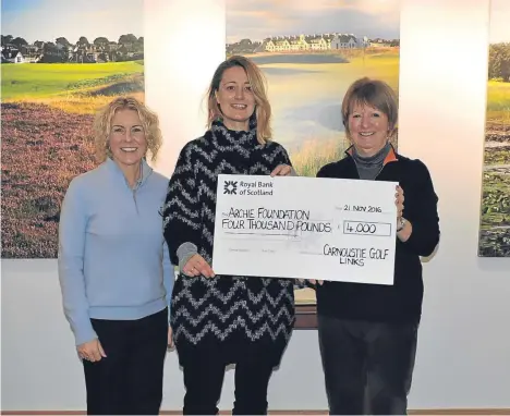  ??  ?? CARNOUSTIE Golf Links has made a £4,000 donation to the Archie Foundation following its sponsorshi­p of Oor Golfer.
The links, which include the historic championsh­ip course that’s one of the venues on the Open rotation, had backed the Oor Wullie...