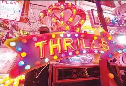  ??  ?? An array of neon lights and signs is displayed on Own Junkyard gallery, cafe and workshop
in Nalthamsto­w, east London on July 8. (AFP)