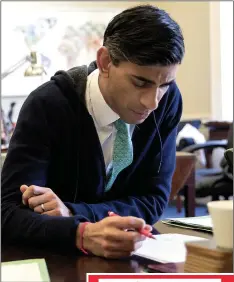  ??  ?? Money man...Chancellor Rishi Sunak working at the Treasury yesterday