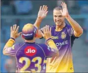  ?? AP ?? Kolkata Knight Riders' Nathan Coulter Nile and Gautam Gambhircel­ebrate the dismissal of Karun Nair.