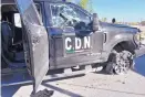  ?? GERARDO SANCHEZ/ASSOCIATED PRESS ?? A pickup truck used by the Cartel of the Northeast stands damaged after a gunbattle in Villa Union, Mexico, on Sunday.