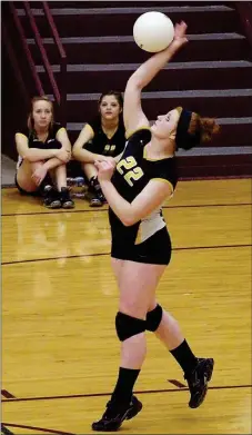  ?? RANDY MOLL NWA MEDIA ?? Senior Makayla Calvin serves for Prairie Grove against Huntsville in the District 4A-1 consolatio­n volleyball match on Thursday. The Lady Tigers defeated the Eagles, 25-21, 25-16, and 25-22, to earn the third seed from the conference going into the...