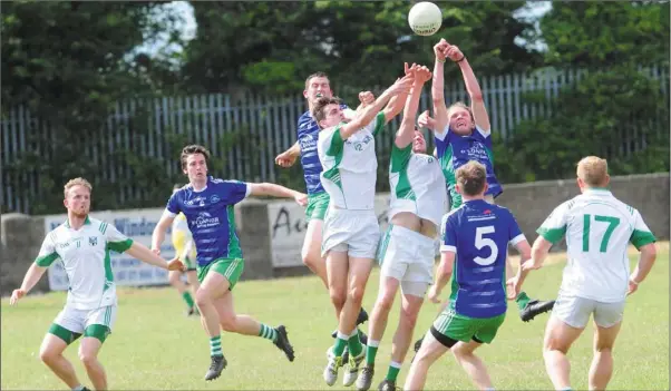  ?? Pictures: Aidan Dullaghan ?? Players jostle for possession during the Geraldines v St Patrick’s SFC Group C tie at St Brigid’s Park on Sunday.