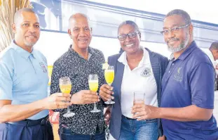  ?? ?? Pictured from left: Robin Levy, JCCUL Group CEO, Almando Jones, JCCUL Group Chief Financial Officer, Dorothea Blackman Brown from Antigua & Barbuda Co-operative Credit Union League, and Mark Bowen, Insurance Employees Co-operative Credit Union manager, share a toast to the ‘Access Di Access + Brawta’ launch.
