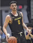  ?? Kathleen Helman / Ualbany Athletics ?? Ualbany's Antonio Rizzuto had 17 points in the first half on Saturday after scoring 25 points on Friday.