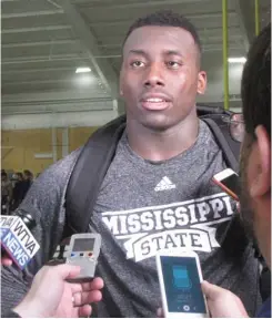  ?? (Photo by Danny P. Smith, SDN) ?? Mississipp­i State tight end Jordan Thomas answers questions from the media following his workout at MSU Pro Day at the Palmeiro Center on Wednesday morning.