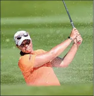  ?? NWA Democrat-Gazette/ANDY SHUPE ?? of Virginia Tech hits out of a bunker Friday during the first day of competitio­n of the NCAA golf championsh­ips at Blessings Golf Club in Fayettevil­le.