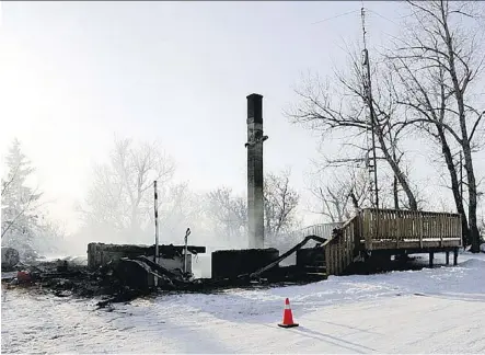  ?? RCMP ?? The ruins of the Klaus residence in Castor on Dec. 8, 2013, where two of the victims were found.