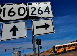  ?? MATT YORK/ASSOCIATED PRESS ?? A stretch of US 160 in Arizona is the de facto border between the Navajo and Hopi reservatio­ns and two time zones.